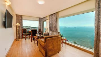 Suite, 1 King Bed, Sea View | Premium bedding, minibar, in-room safe, desk