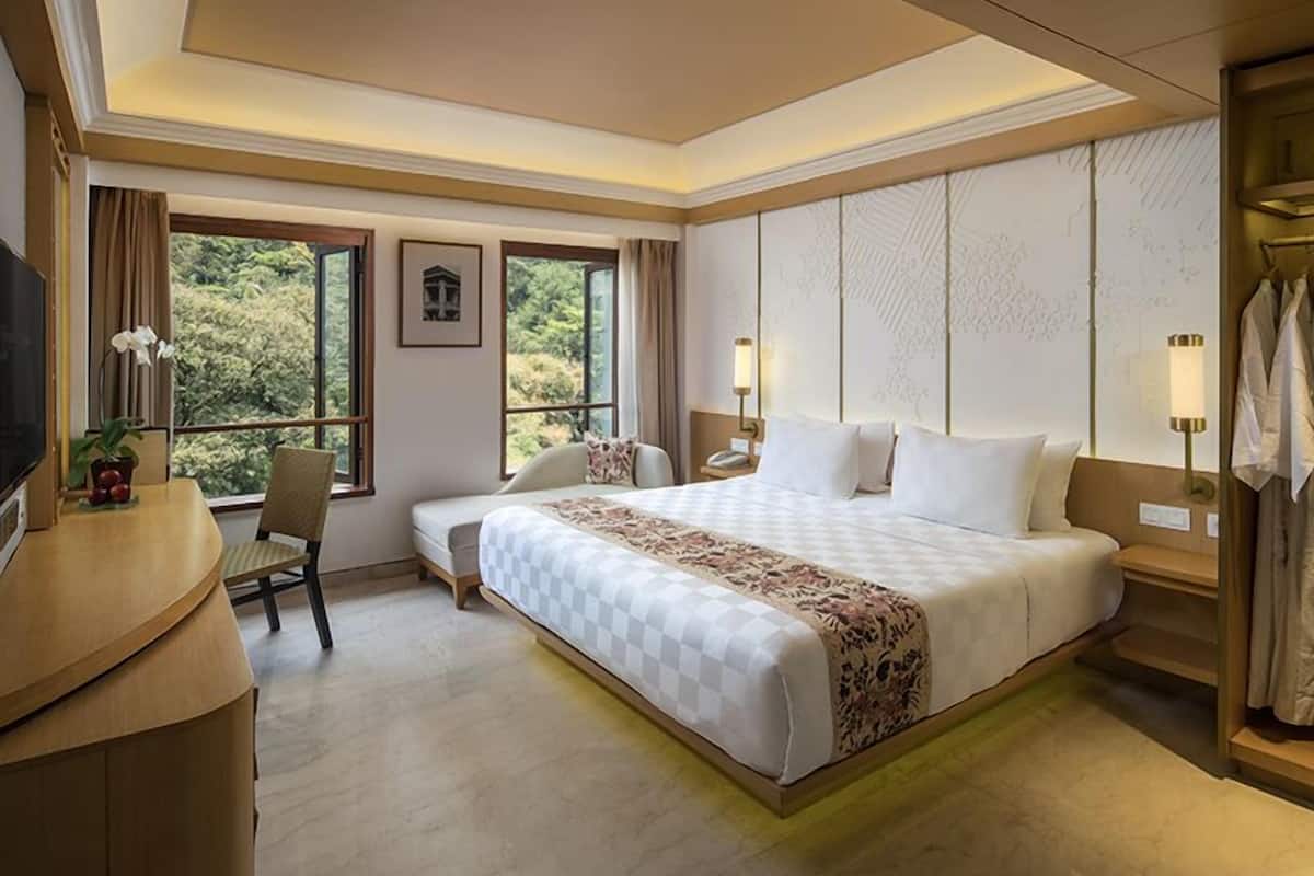 Deluxe kamer, 1 kingsize bed | 1 slaapkamer, luxe beddengoed, een kluis op de kamer, een laptopwerkplek
