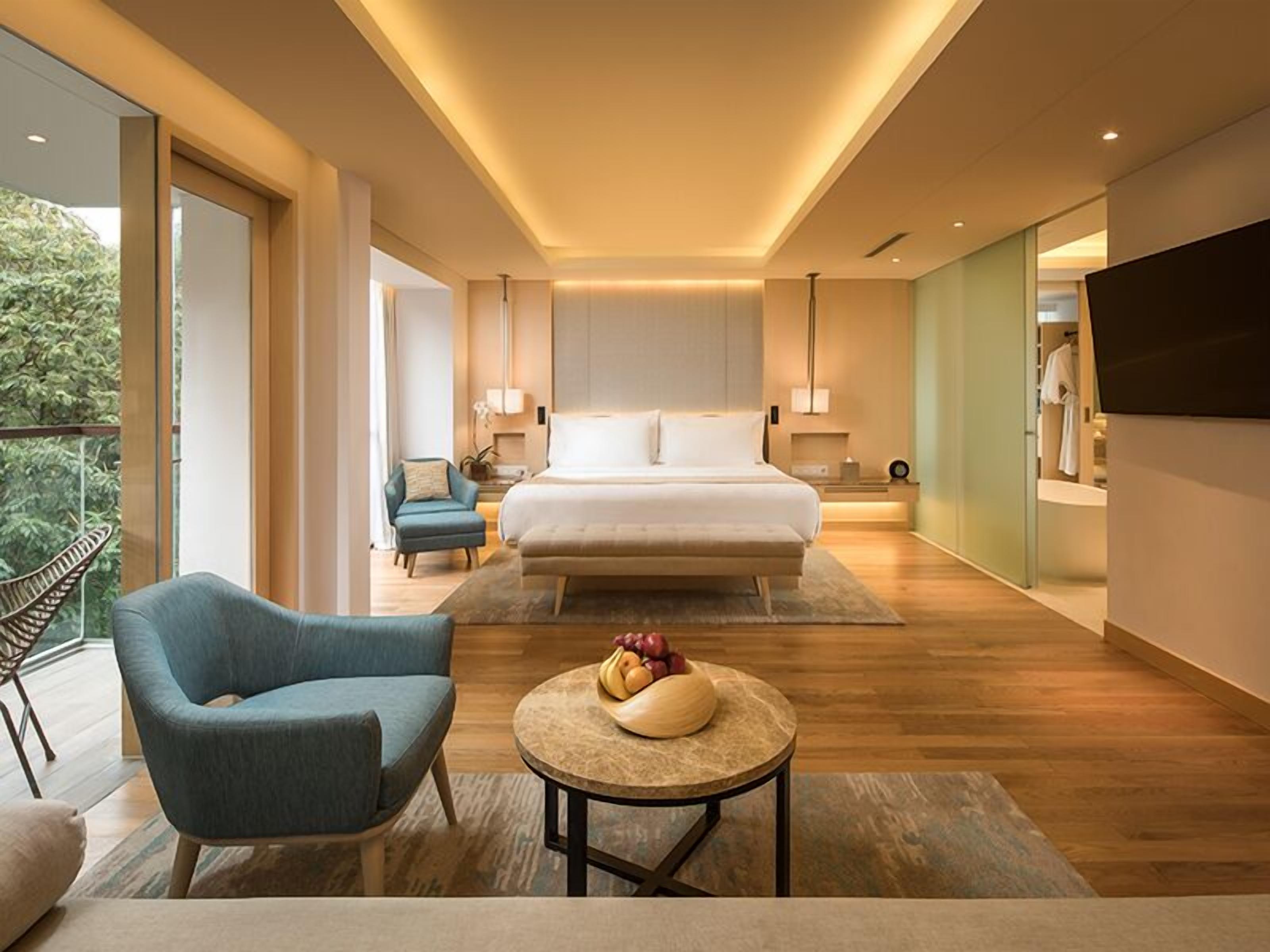 premier suite, 1 king bed | premium bedding, in-room safe, laptop workspace, iron/ironing board