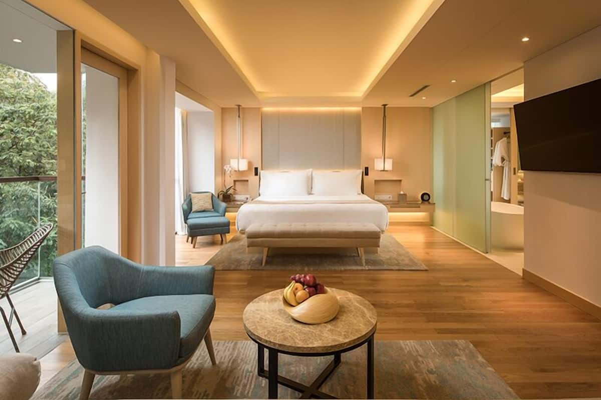 premier suite, 1 king bed | premium bedding, in-room safe, laptop workspace, iron/ironing board