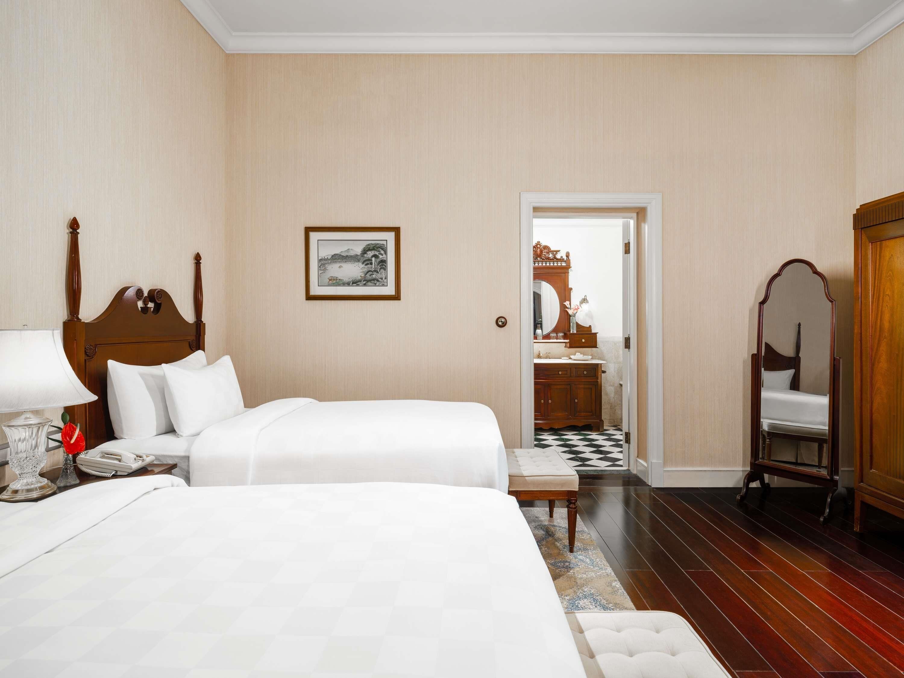 Suíte, 2 camas de solteiro (Heritage) | Frigobar, cofres nos quartos, escrivaninha