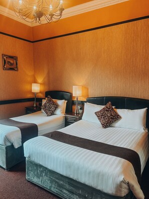 Triple Room | 1 bedroom, individually decorated, desk, iron/ironing board