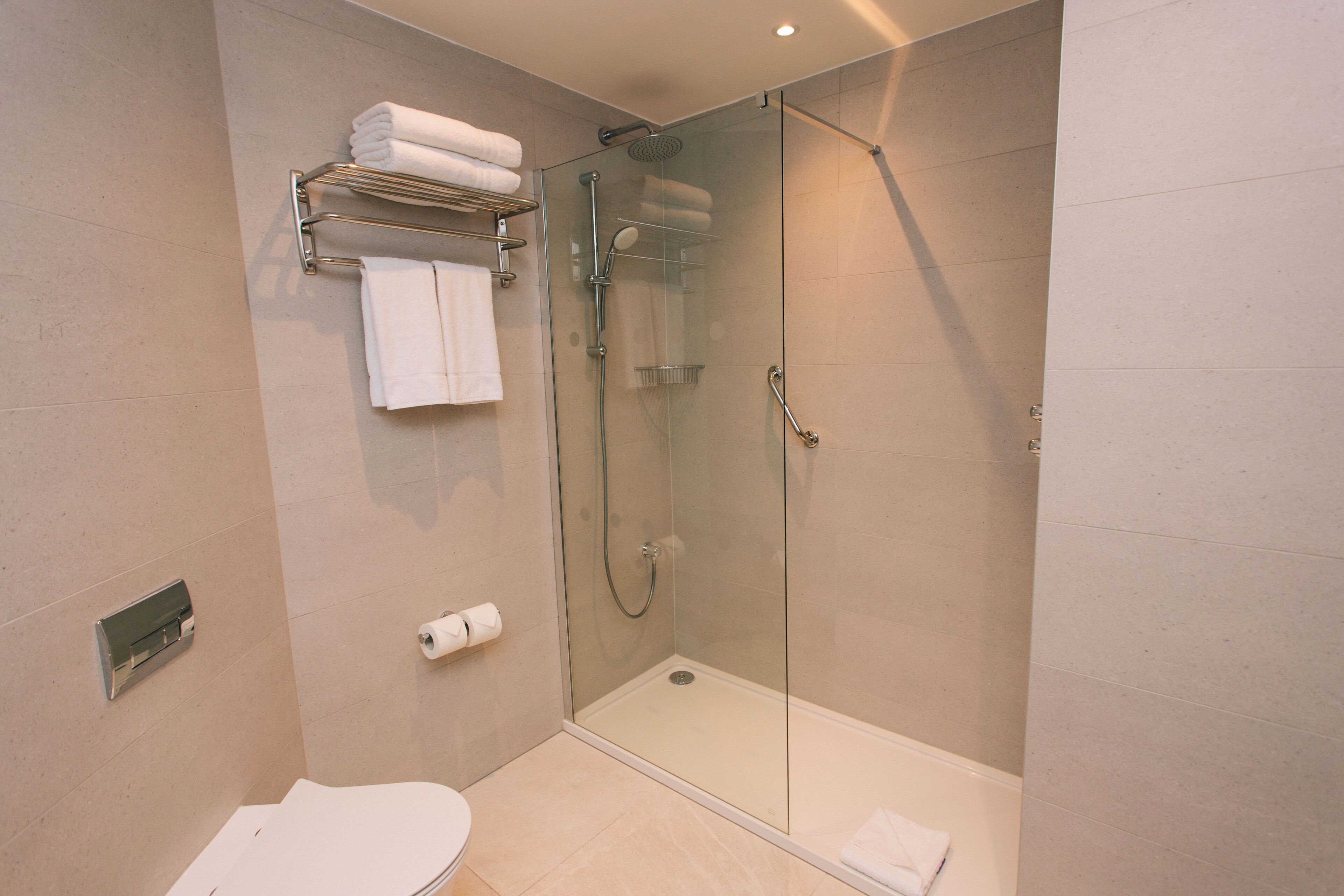 shower, rainfall showerhead, designer toiletries, hair dryer