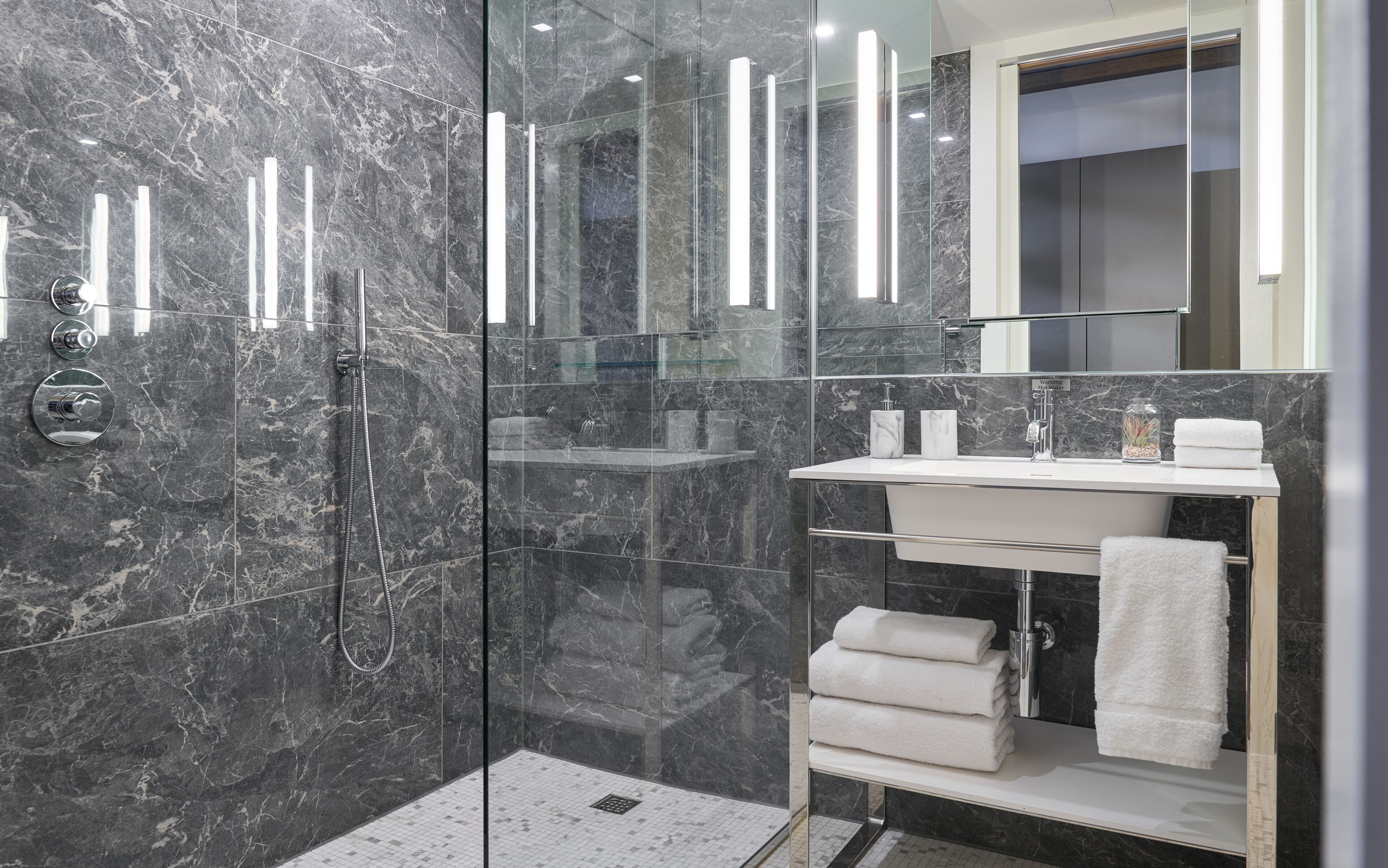 combined shower/bathtub, free toiletries, hair dryer, towels