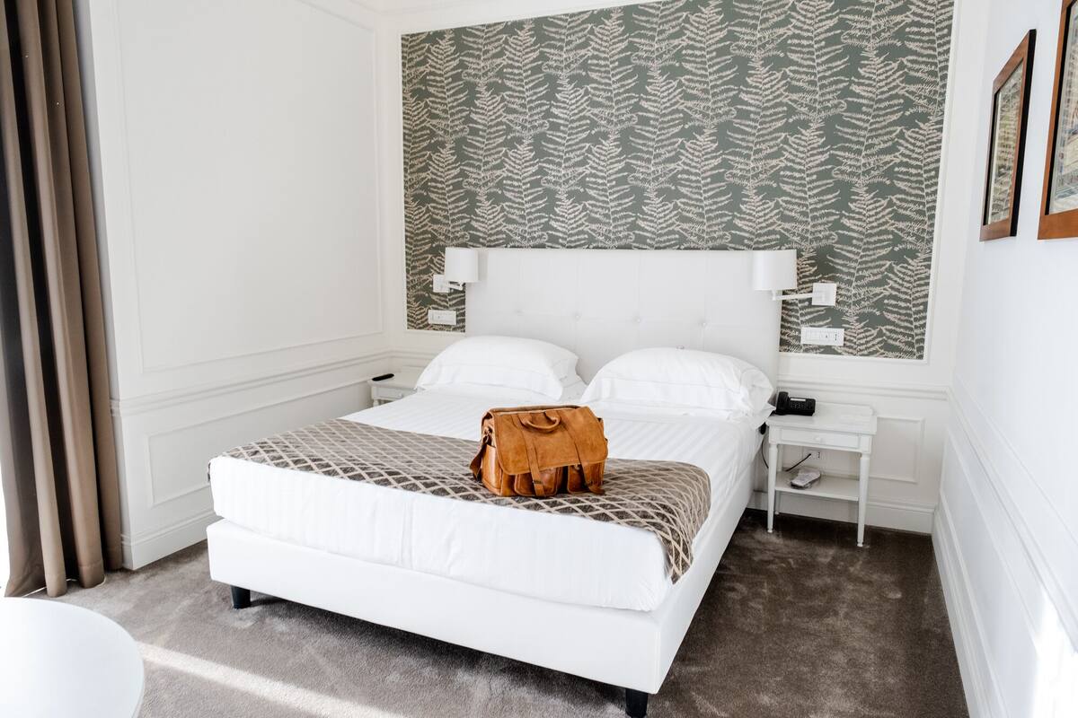 Executive Room | Premium bedding, down comforters, minibar (free items), in-room safe