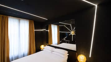 Premium bedding, down duvets, minibar, in-room safe
