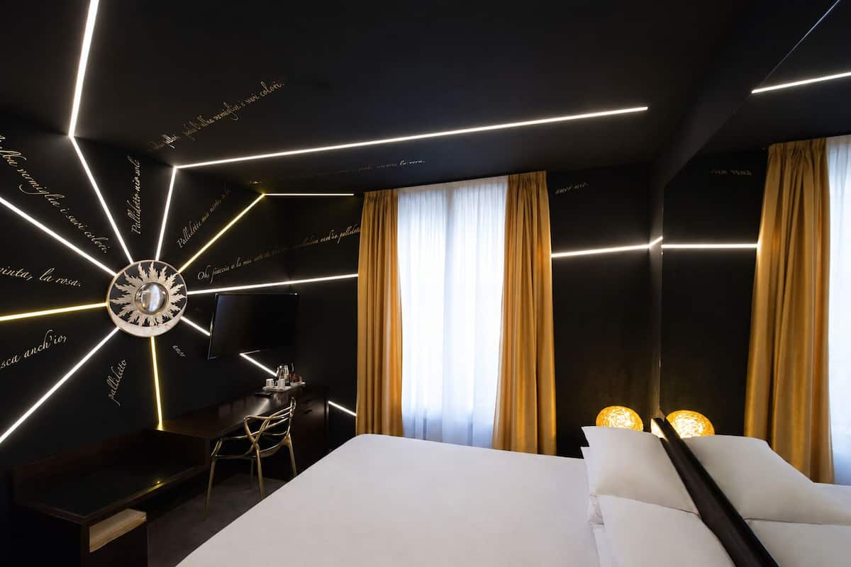 ARTSY room | Premium bedding, down duvets, minibar, in-room safe