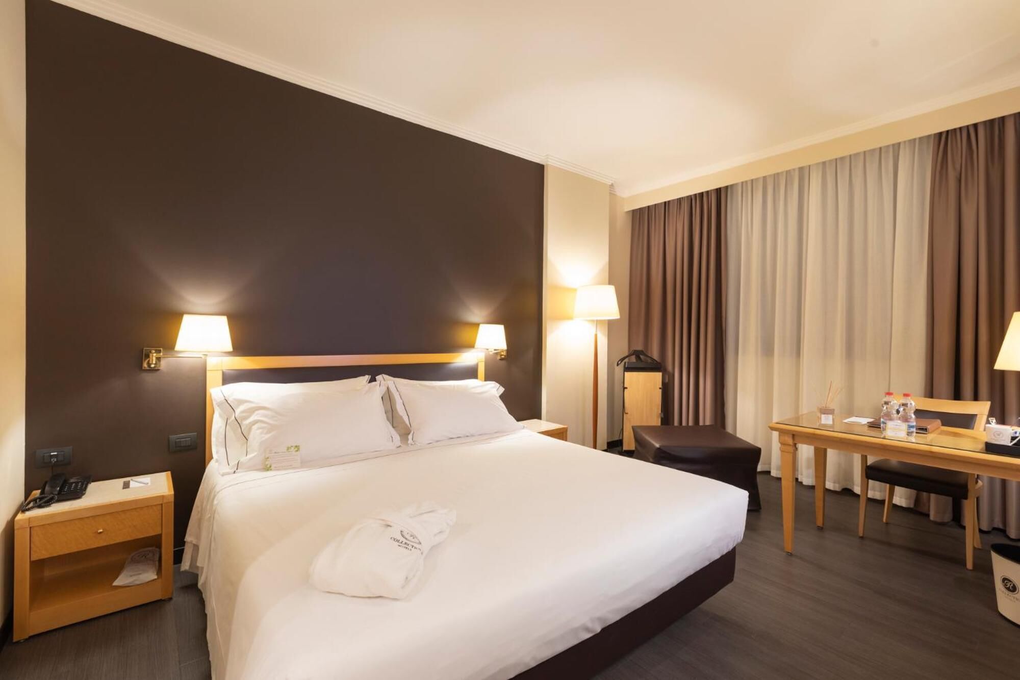 premium bedding, down duvets, minibar, in-room safe