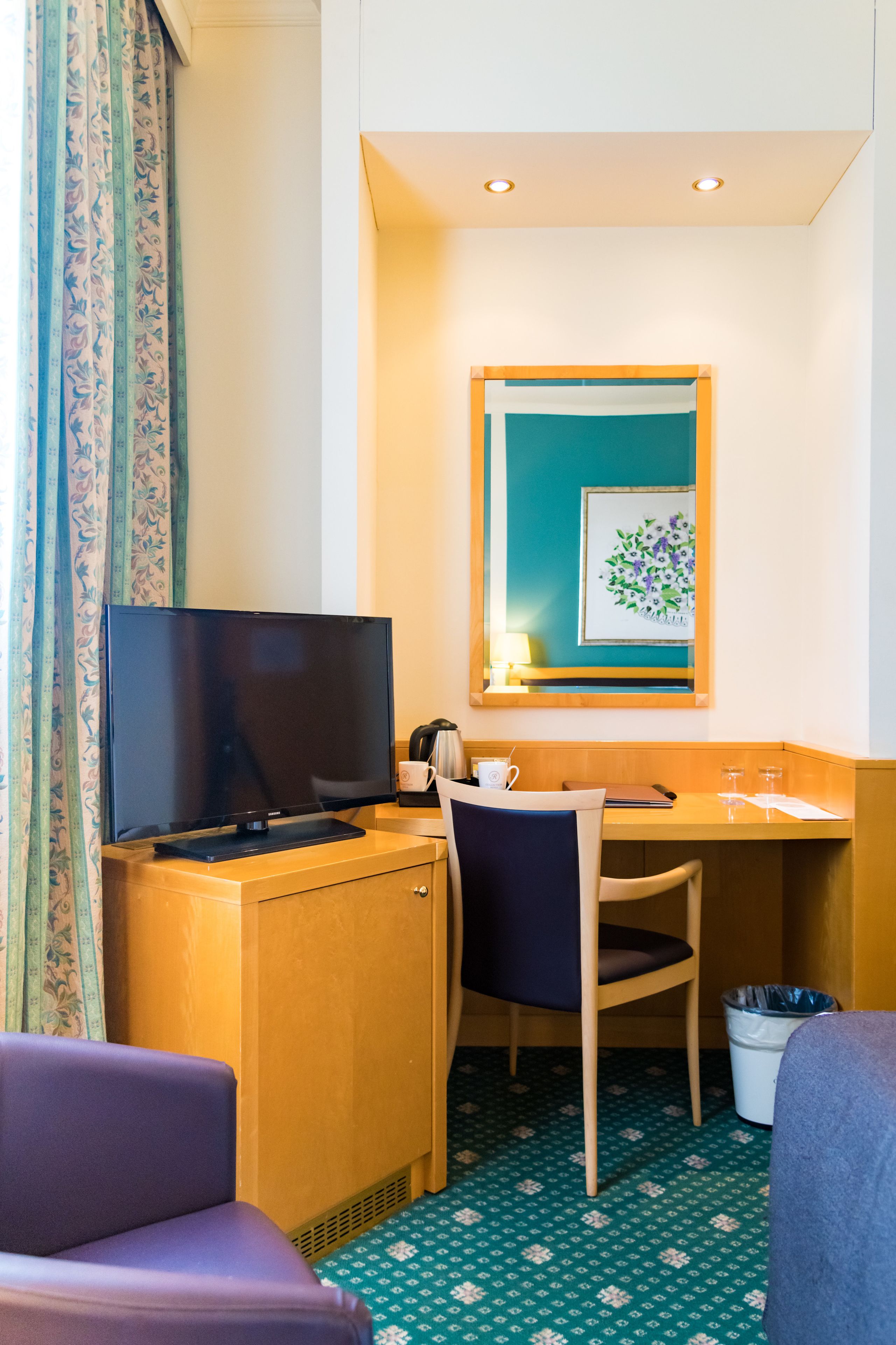 premium bedding, down duvets, minibar, in-room safe