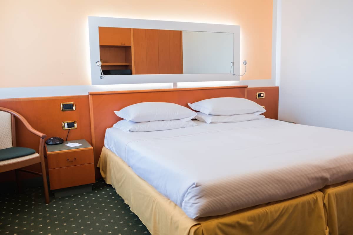 Premium bedding, down comforters, Select Comfort beds, in-room safe