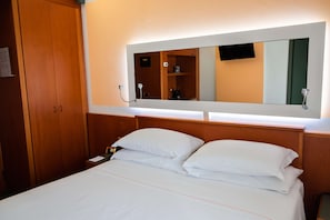 Premium bedding, down comforters, Select Comfort beds, in-room safe