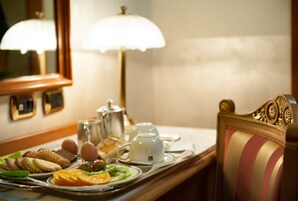 Premium bedding, down comforters, minibar, in-room safe