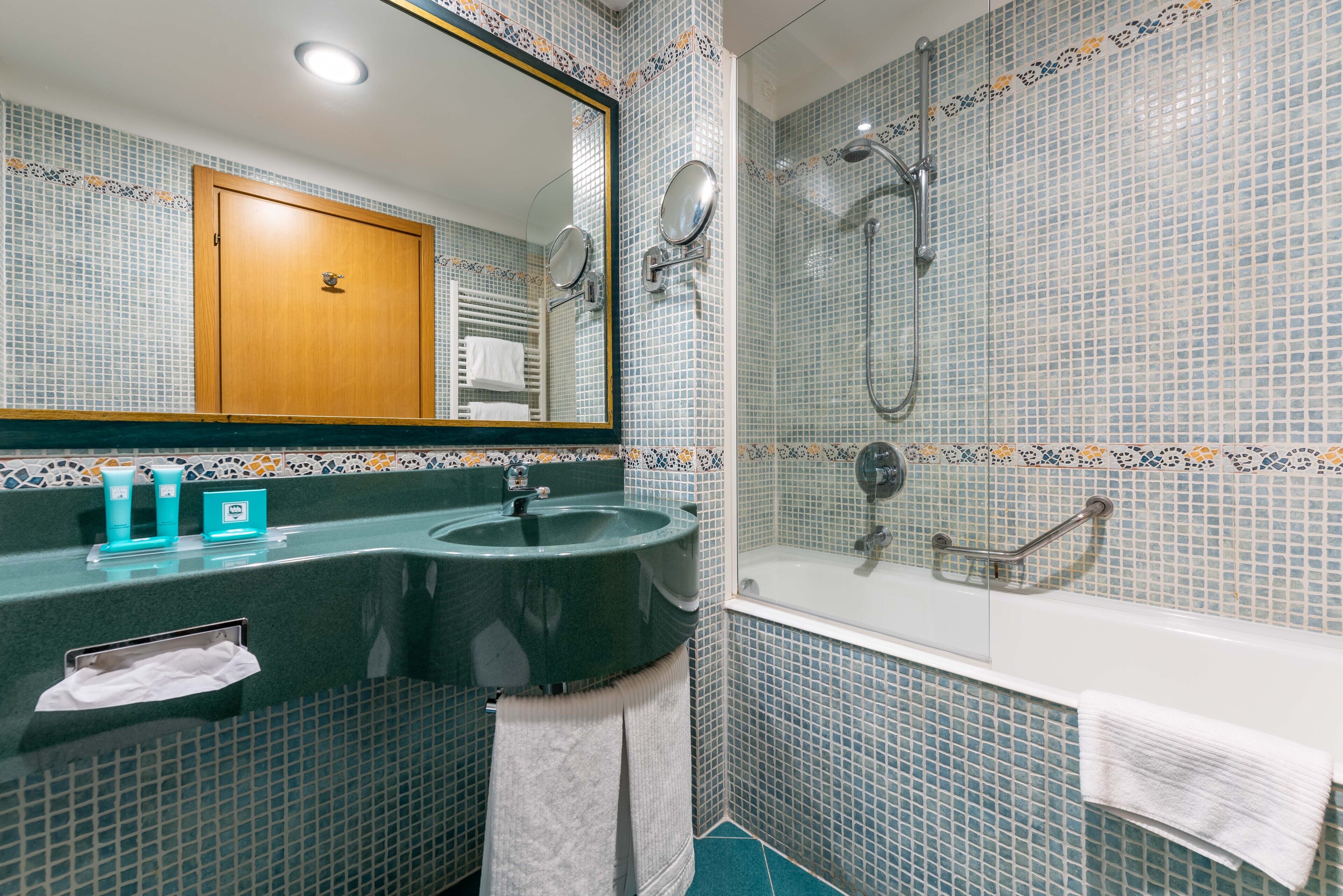 shower, free toiletries, hair dryer, slippers