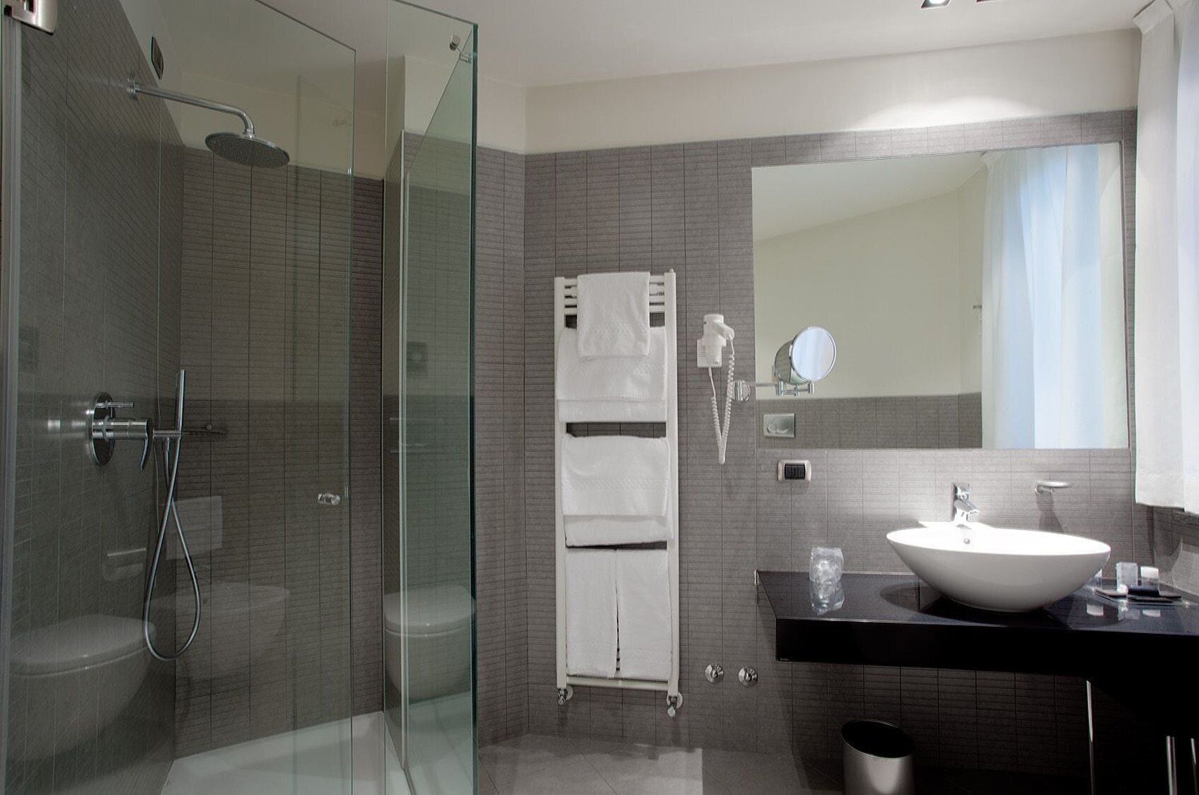 jetted bath, rainfall showerhead, free toiletries, hair dryer