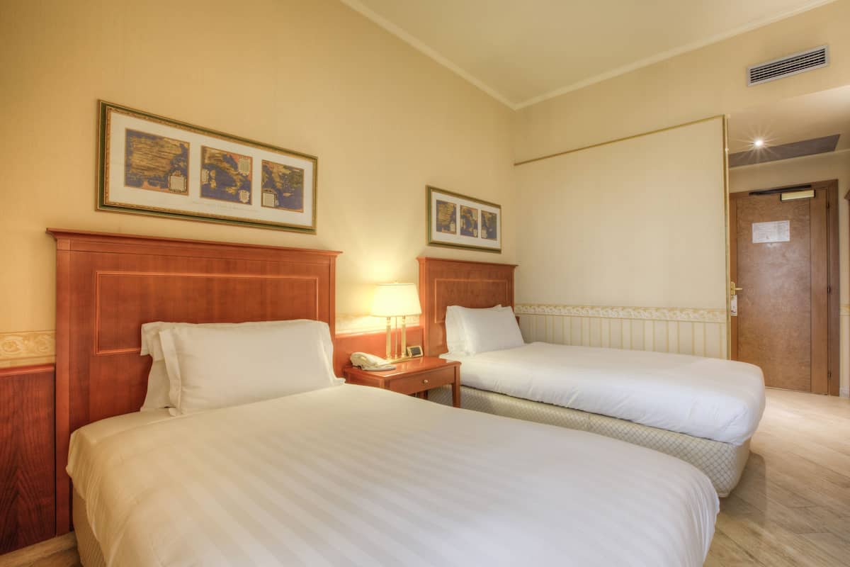 Egyptian cotton sheets, premium bedding, down comforters, minibar