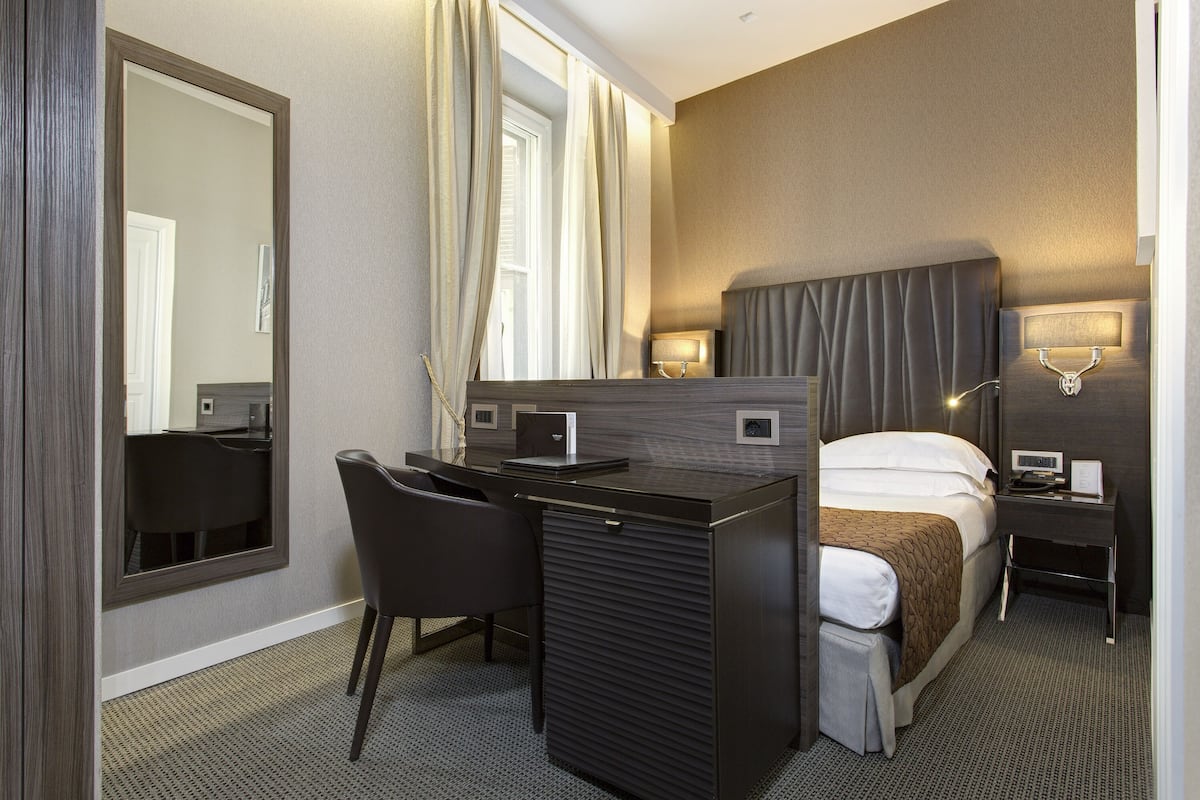 Premium bedding, memory foam beds, free minibar, in-room safe