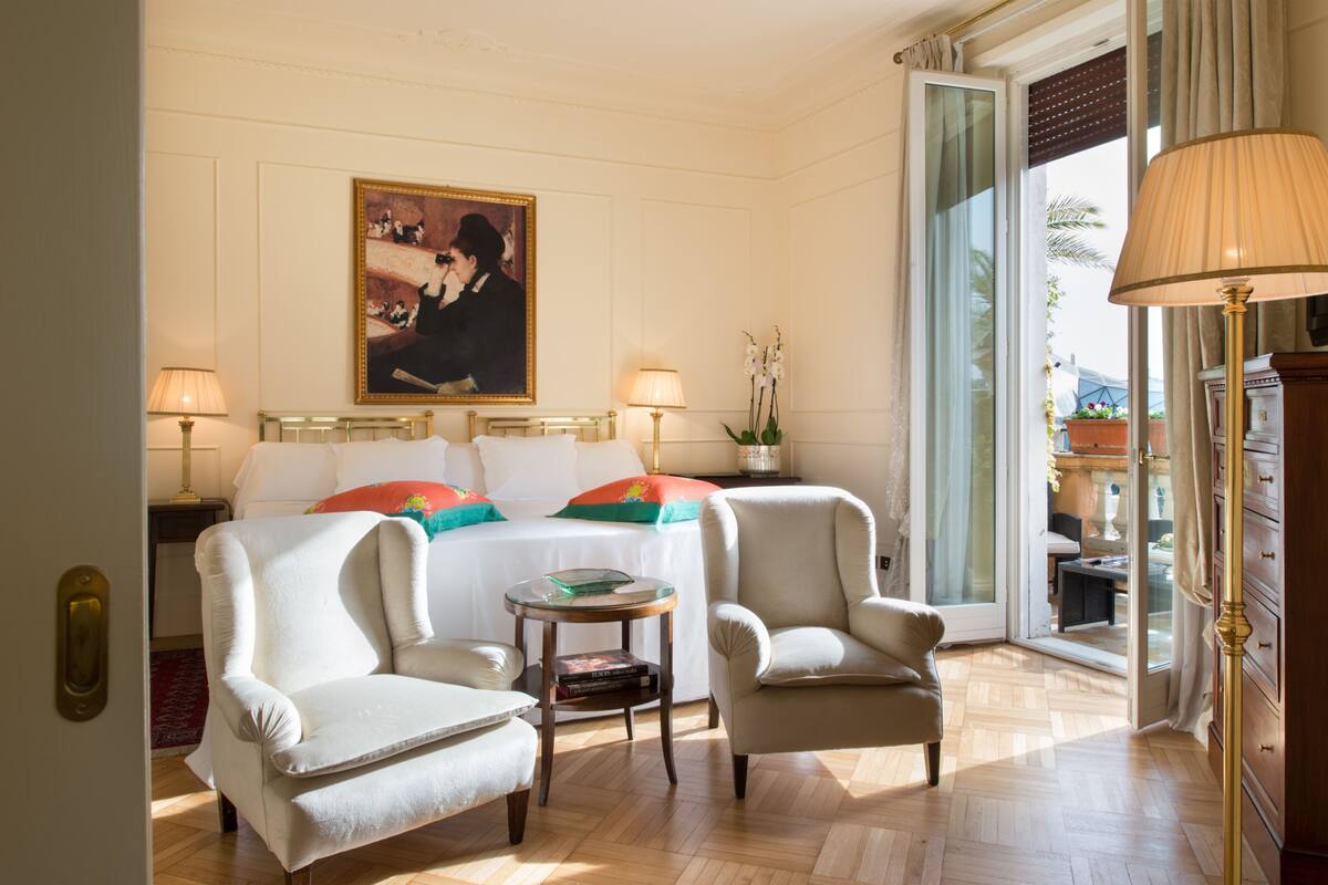 Premium bedding, down comforters, free minibar items, in-room safe