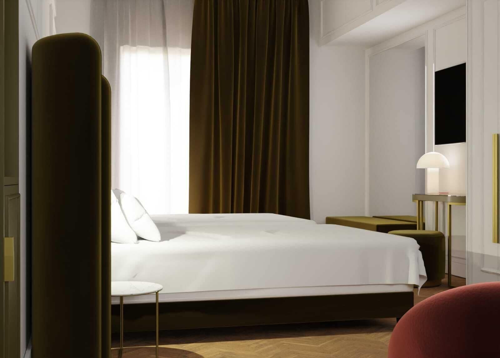 A modern hotel room with a large bed, a bedside table, a lamp, and a view of the outdoors.
