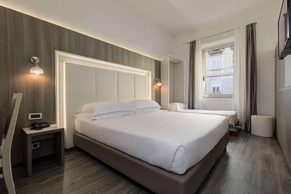 Hypo-allergenic bedding available, down comforters, minibar