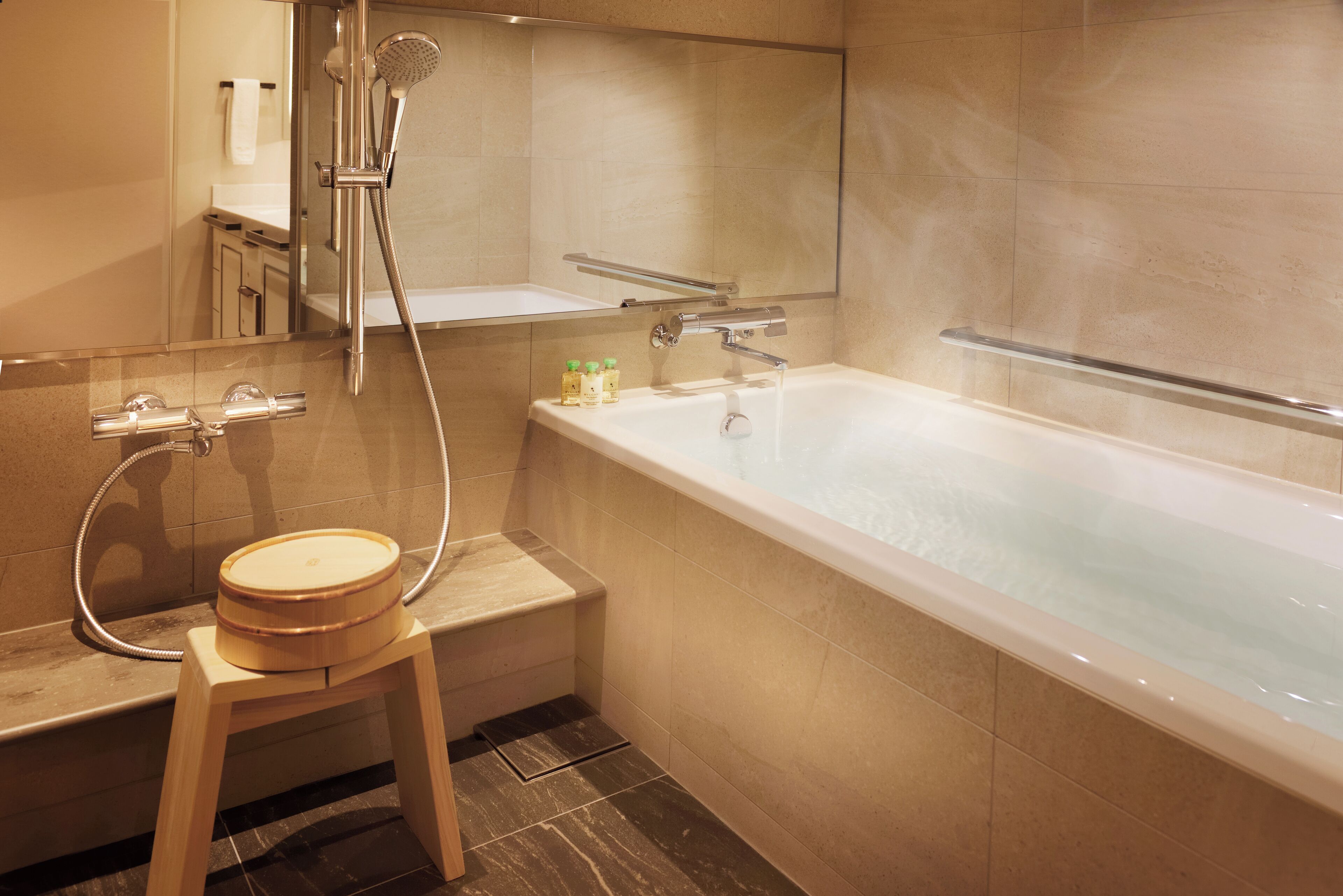 combined shower/bathtub, free toiletries, hair dryer, slippers