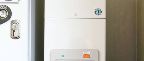 A refrigerator with an ice dispenser and a freezer compartment.