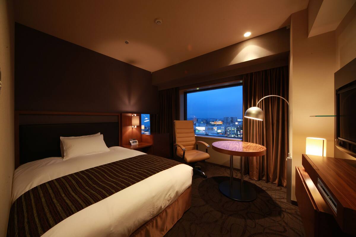 Premium bedding, down duvets, in-room safe, desk