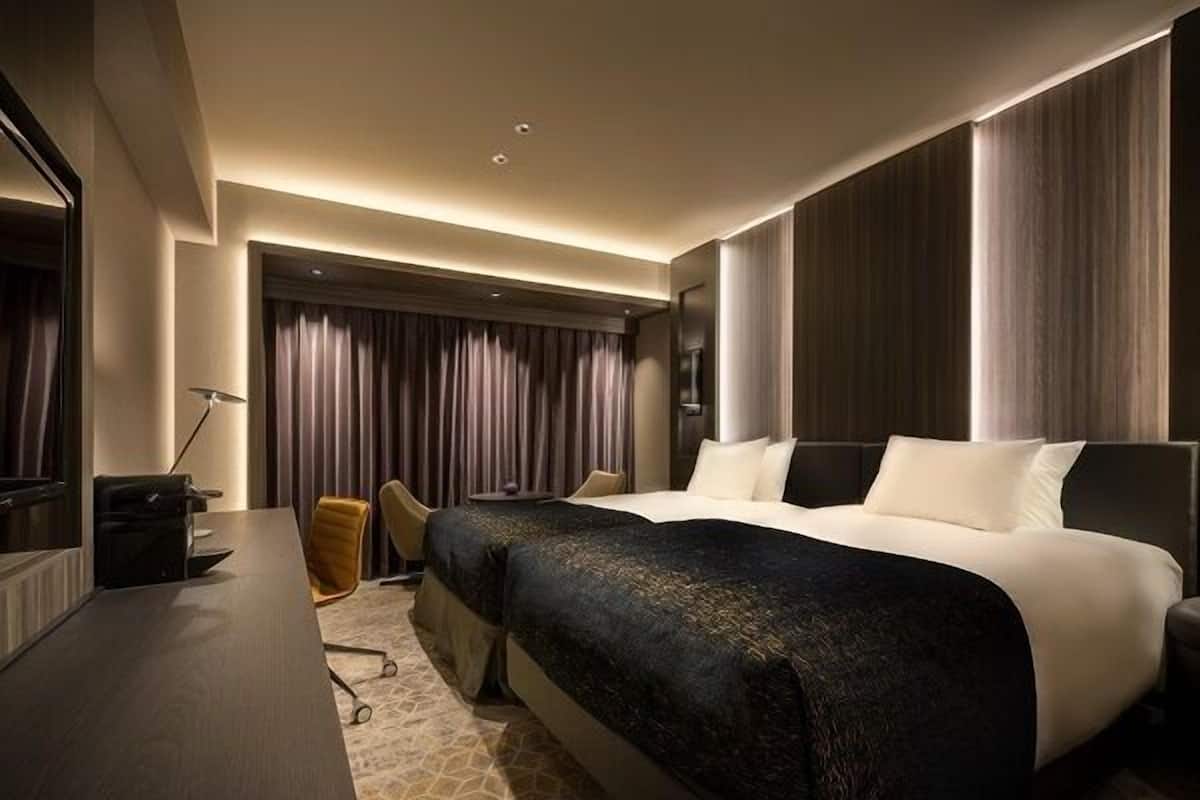 Premium bedding, down duvets, in-room safe, desk