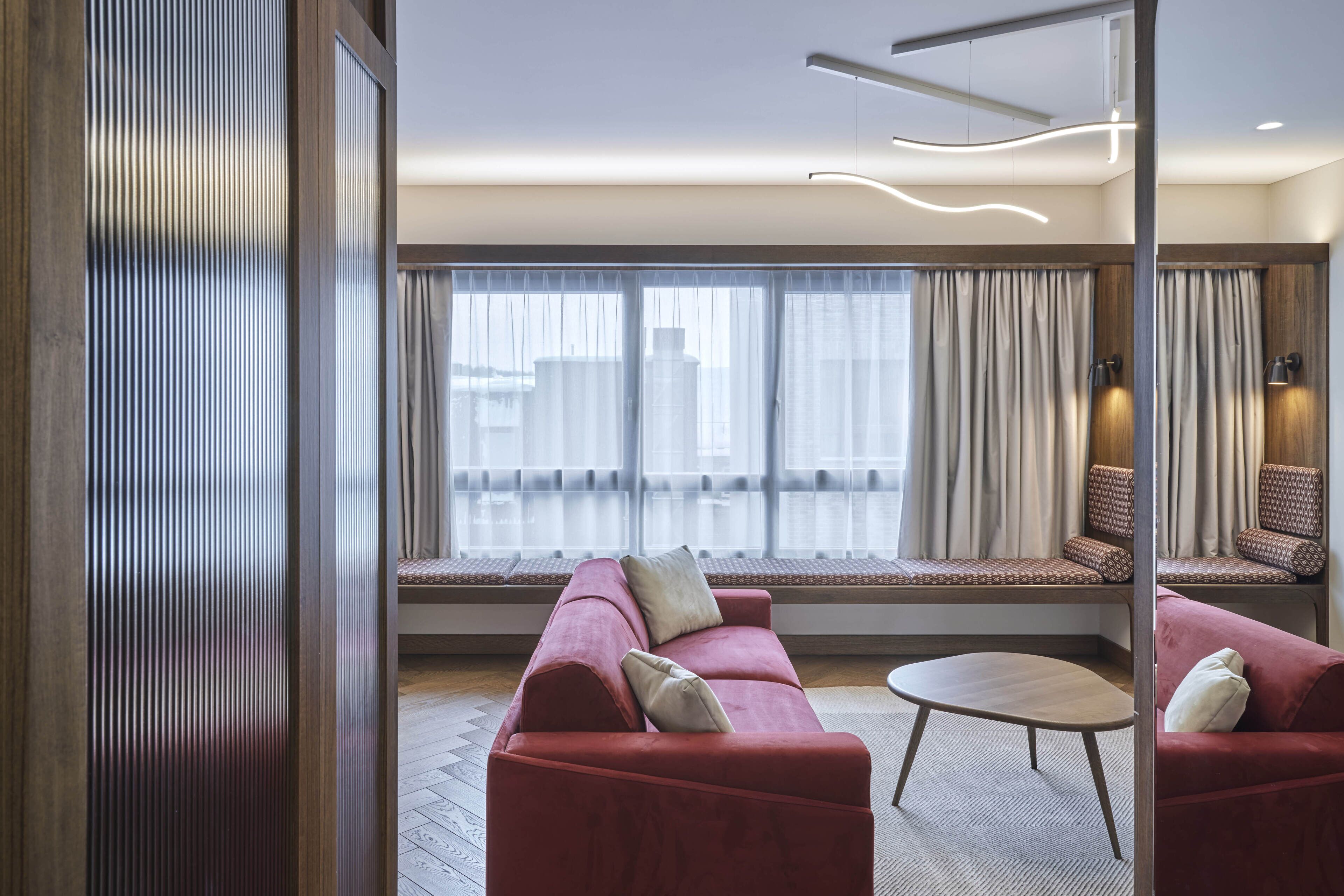 luxury suite | living area | 49-inch led tv with satellite channels, tv, heated floors