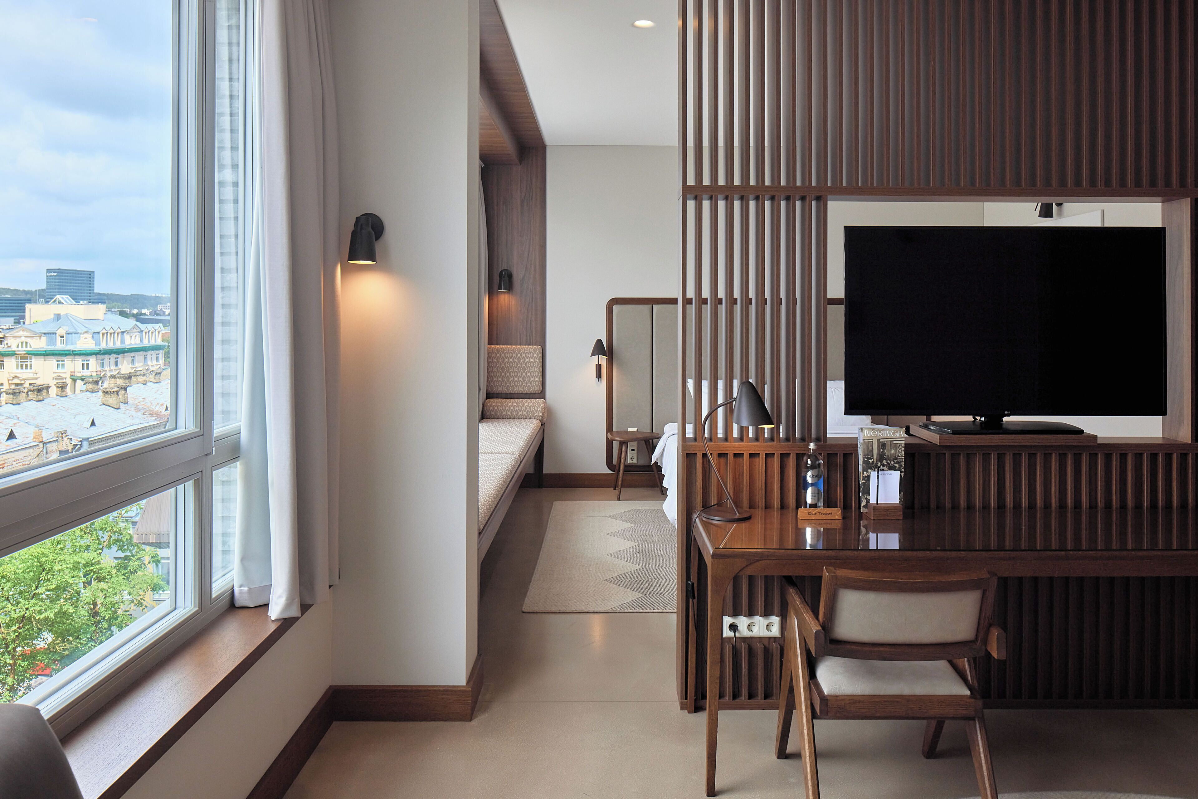 Studiosuite | Oppholdsområde | En 49-tommers LED-TV med Parabol-TV samt TV og oppvarmet gulv