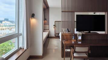 Studio Suite | Living area | 49-inch LED TV with satellite channels, TV, heated floors