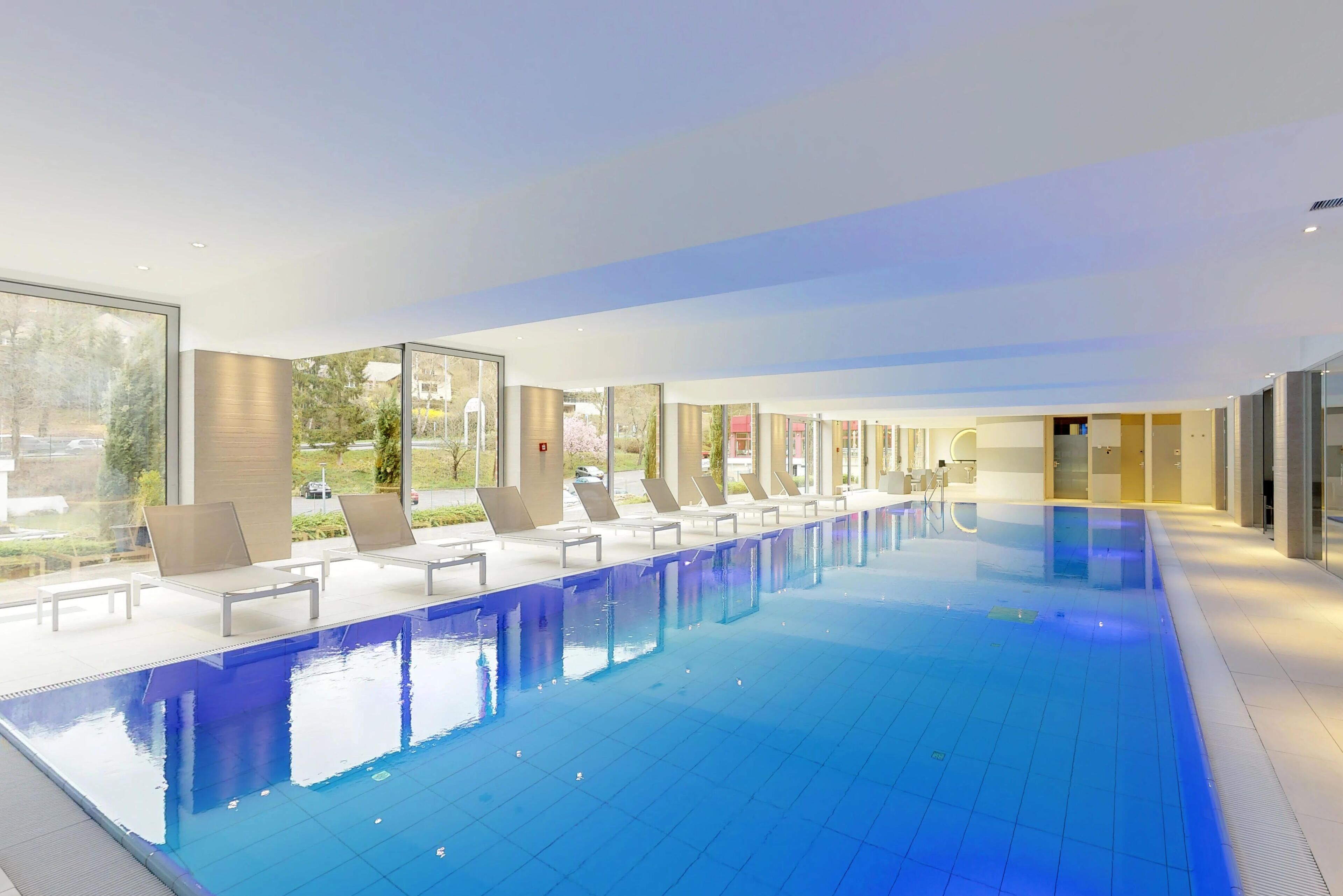indoor pool, seasonal outdoor pool, pool loungers