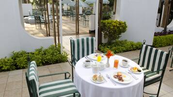 Breakfast, lunch, dinner served; garden views