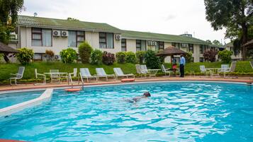 Outdoor pool, open 8:00 AM to 5:00 PM, pool umbrellas