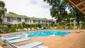 Outdoor pool, open 8:00 AM to 5:00 PM, pool umbrellas