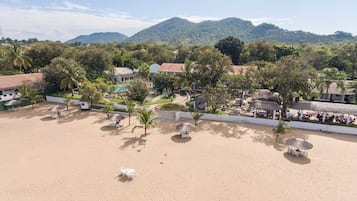 On the beach, beach umbrellas, windsurfing, sailing