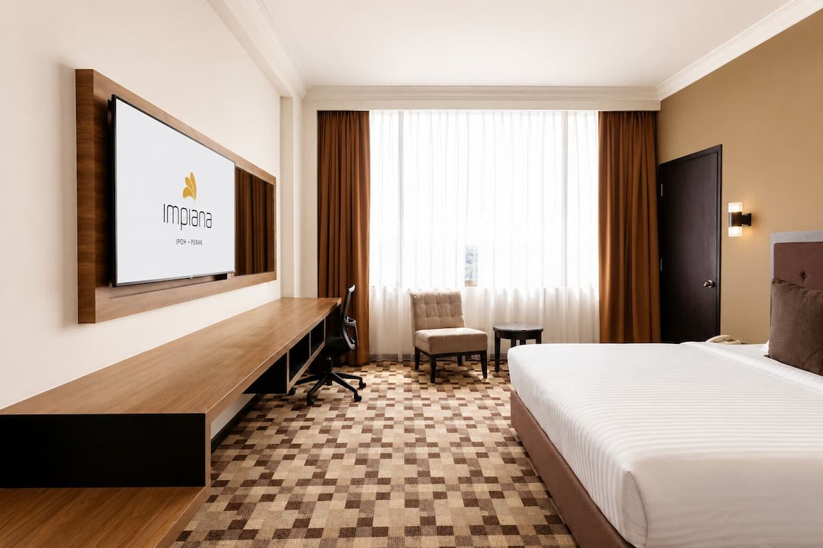 Habitación doble Premier, 1 cama King size | Ropa de cama de alta calidad, camas con pillow-top y minibar