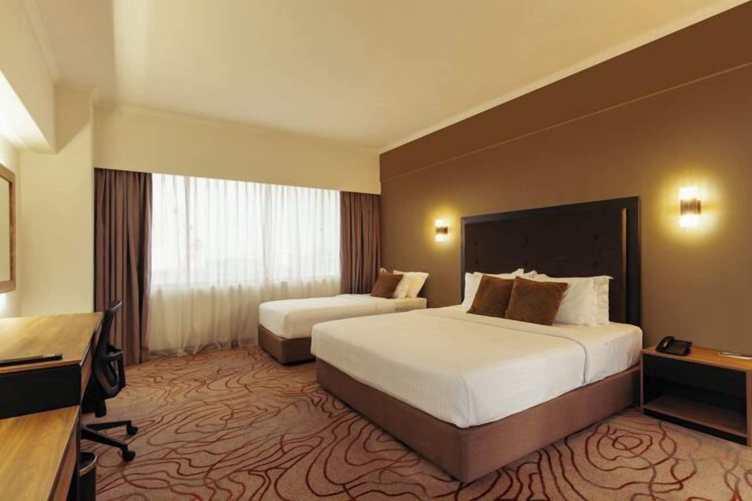 Premium bedding, pillow-top beds, minibar, in-room safe