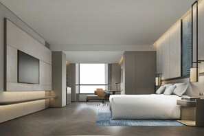 A modern hotel room with a large bed, a desk, and a chair. - Courtyard by Marriott Kuala Lumpur City Centre (Kuala Lumpur)