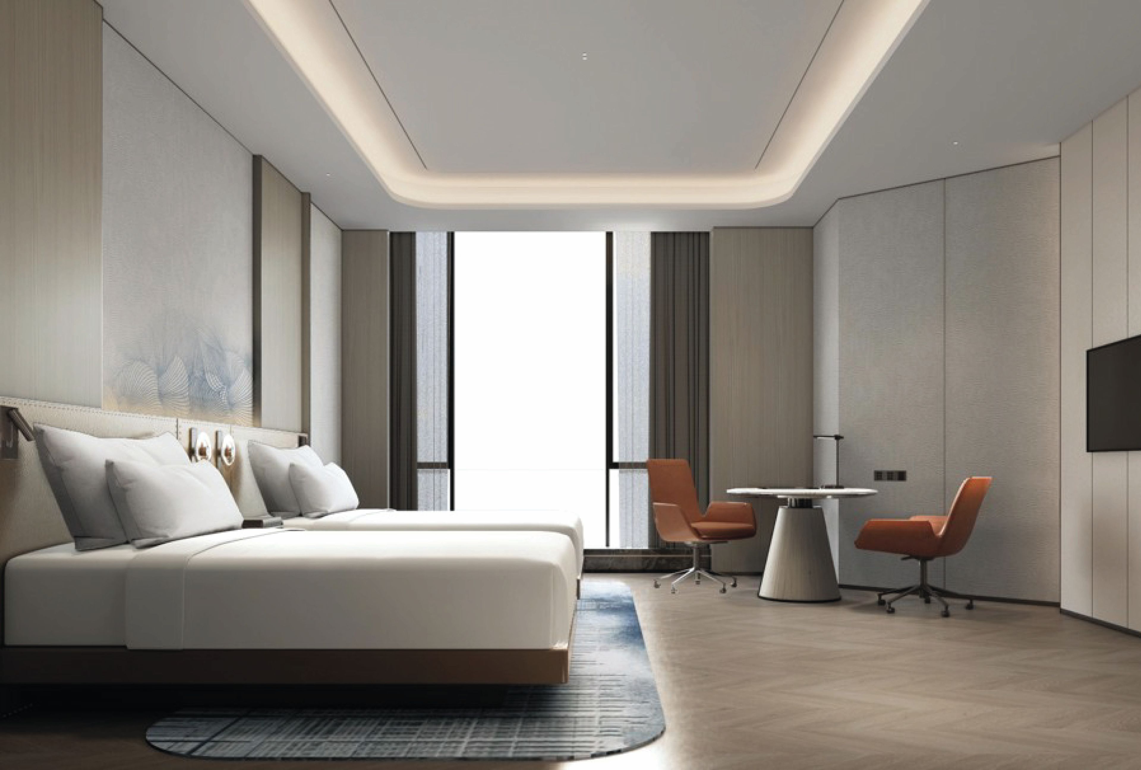 A modern hotel room with a large bed, a desk, two chairs, and a view of the city.
