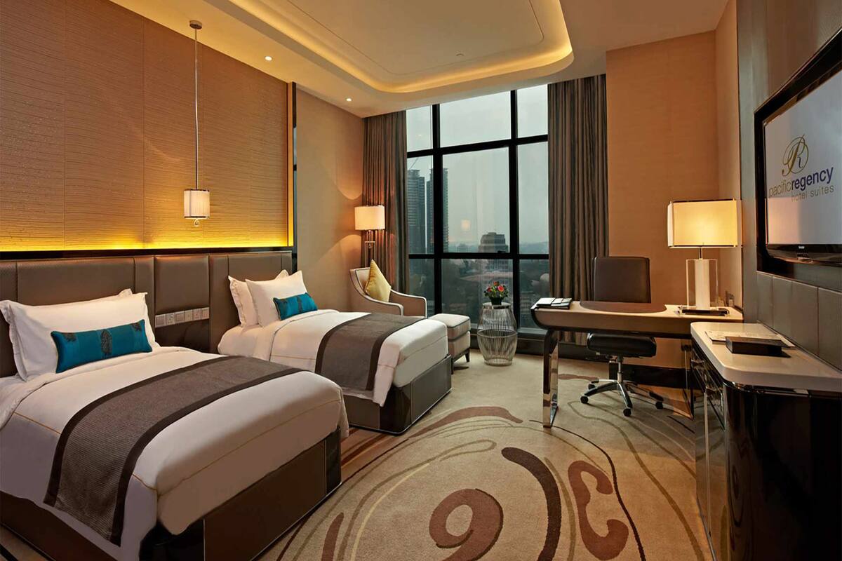 In-room safe, iron/ironing board, cribs (free), WiFi (free)