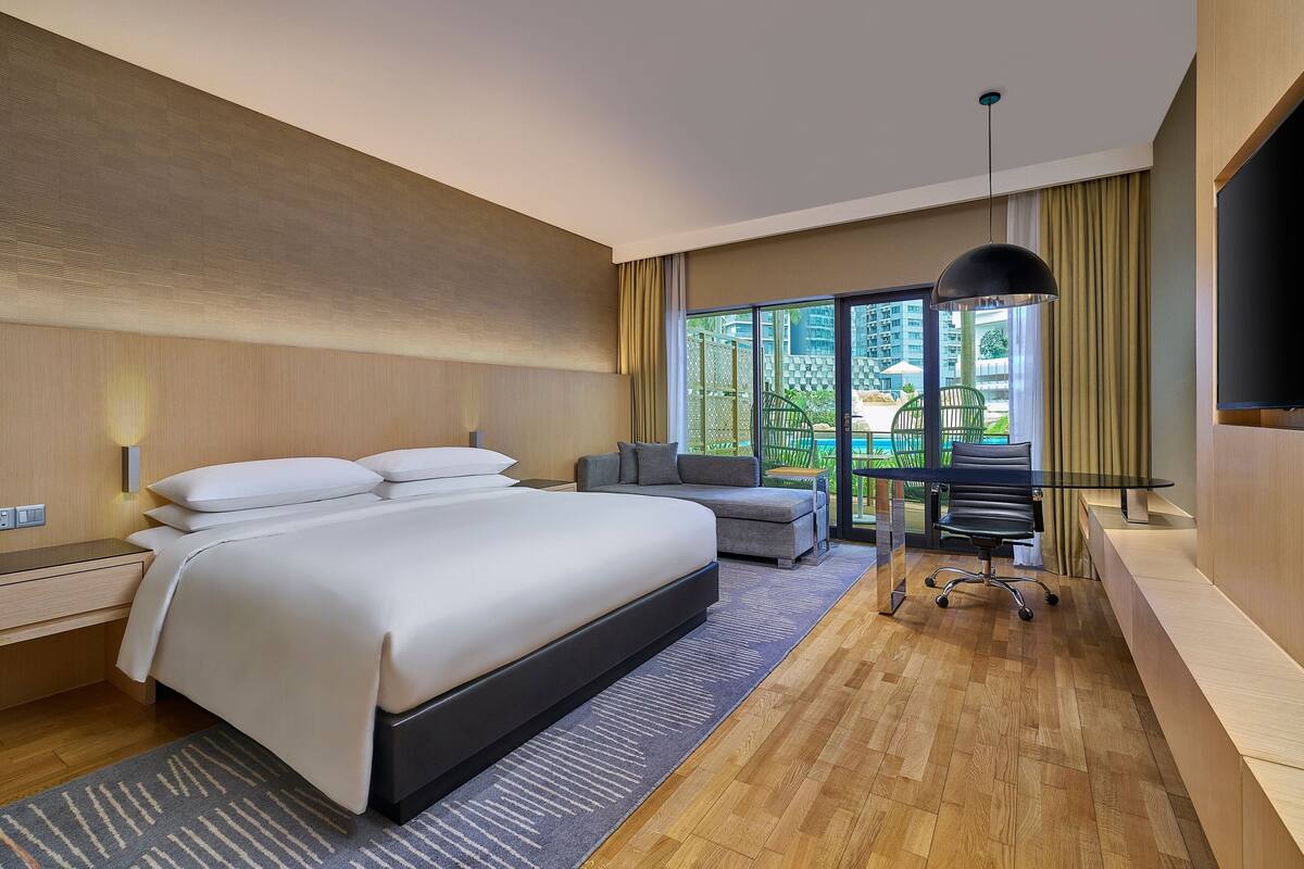Room, 1 King Bed with Sofa bed, Pool View | Premium bedding, minibar, in-room safe, desk