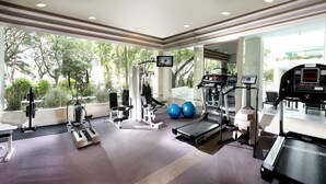 A well-equipped gym with various exercise machines, treadmills, and exercise balls. - Dorsett Grand Labuan (Labuan)