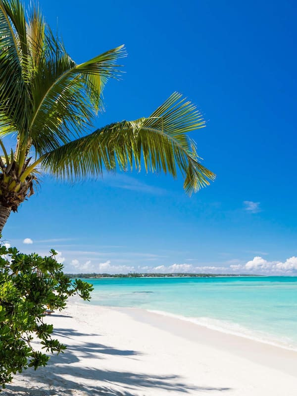 On the beach, white sand, free beach cabanas, sun loungers