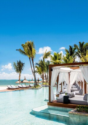 3 outdoor pools, cabanas (surcharge), pool umbrellas