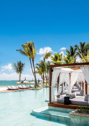3 outdoor pools, cabanas (surcharge), pool umbrellas