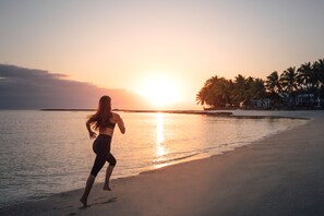 On the beach, white sand, free beach cabanas, sun-loungers