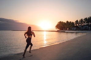 On the beach, white sand, free beach cabanas, sun-loungers