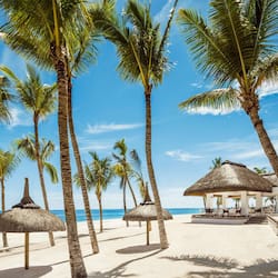 On the beach, white sand, free beach cabanas, sun loungers