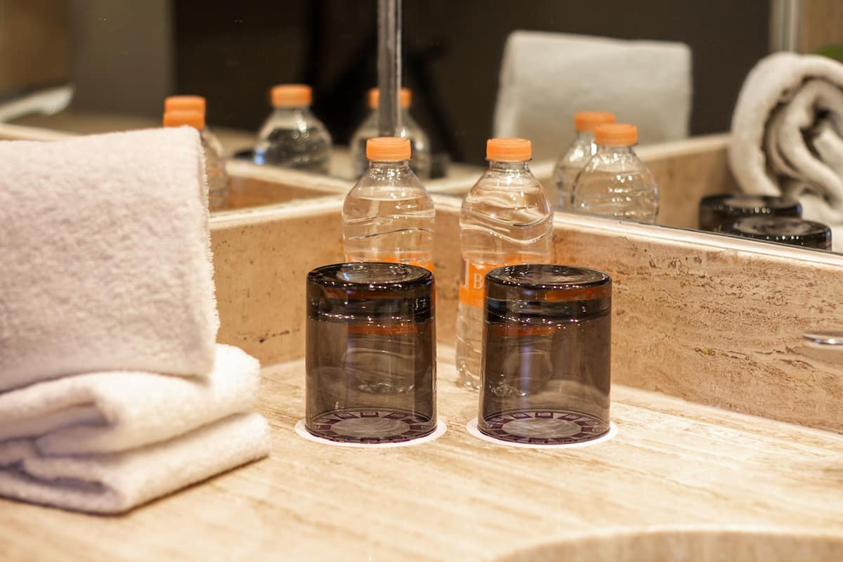 eco-friendly toiletries, hair dryer, towels, soap