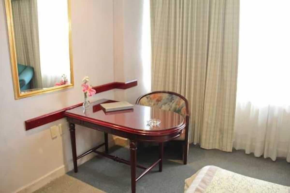 Desk, blackout drapes, free cribs/infant beds, rollaway beds